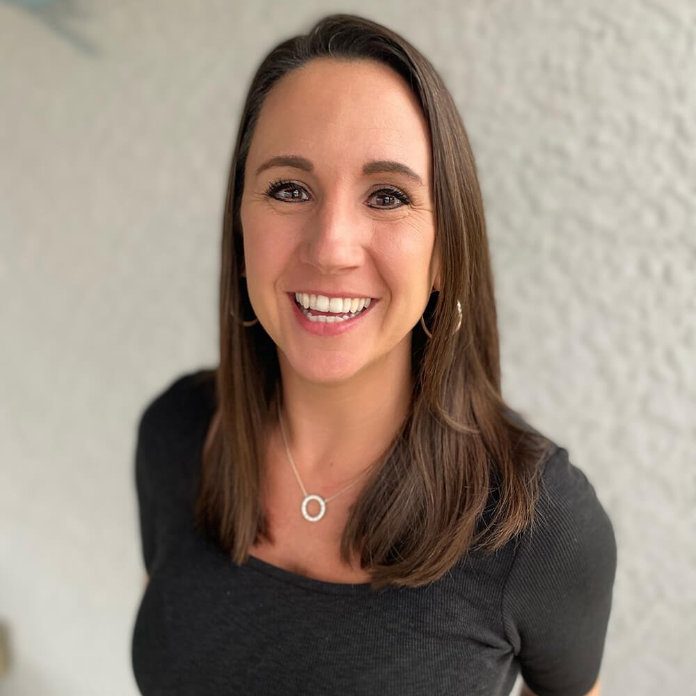 Smiling woman with brown hair