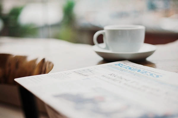 Newspaper with visible headline, symbolizing “above the fold” concept in web design